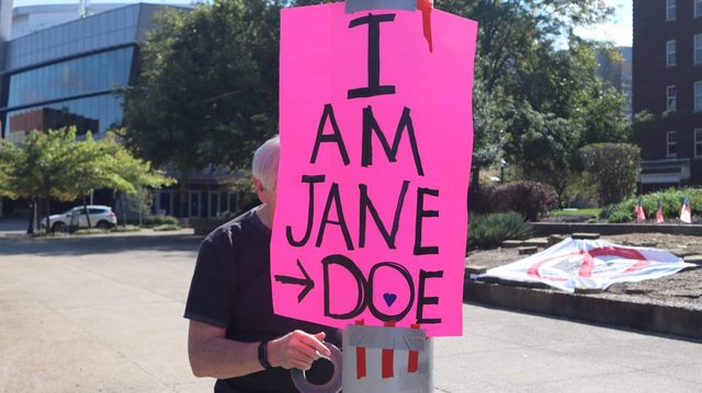 'I Am Jane Doe' demonstrators rally outside the Evansville Civic Center
